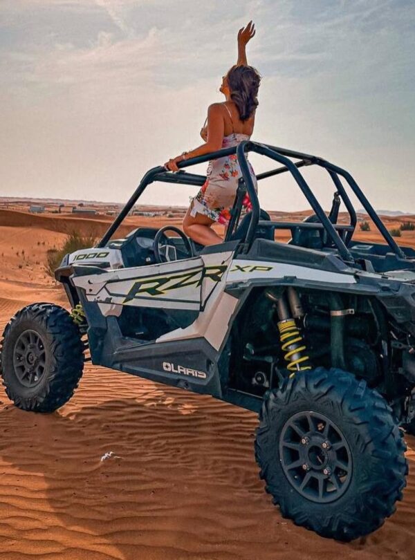 Experience the power of the desert with our 2-Seater Polaris RZR 1000cc buggy – the perfect ride for couples, friends, or thrill-seeking duos. Built with top-tier suspension, full roll cage, and high-torque performance, this machine lets you conquer Dubai’s red dunes side-by-side.