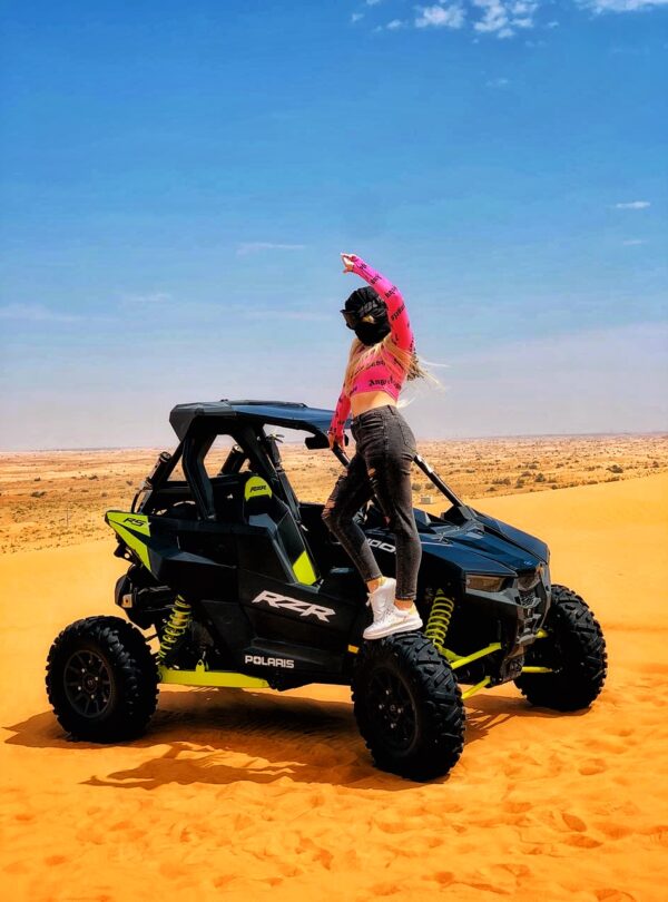 The Polaris RZR XP 1000 (1-Seater) is a high-performance dune buggy (UTV) built for aggressive off-roading. With its powerful 999cc engine, long-travel suspension, and race-ready design, it’s ideal for extreme desert adventures in Dubai. This vehicle offers full control, fast acceleration, and a thrilling ride over red sand dunes — perfect for solo riders who want an adrenaline-filled private experience.