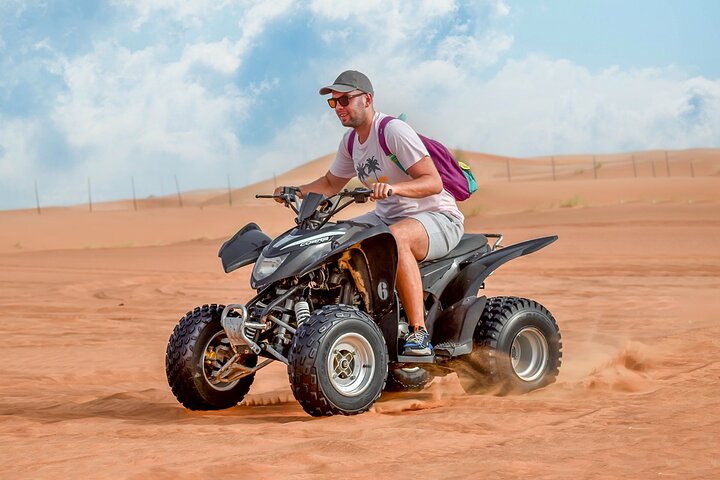 Take your desert adventure to the next level with our 220CC single-seater quad bike, perfect for beginners and thrill-seekers alike. This ride offers a balanced mix of power and control, ideal for exploring golden dunes with confidence.
