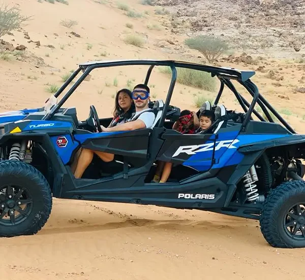 Explore Dubai’s stunning red dunes in one powerful machine built for adventure! The 4-Seater Polaris RZR 1000cc buggy offers high performance, comfort, and safety — ideal for families, friends, or small groups who want to share the fun without splitting into separate rides.
