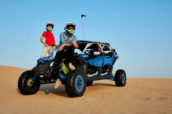 Hit the red dunes of Dubai with your whole crew in one of the most powerful off-road vehicles: the 4-Seater Can-Am Maverick X3 Turbo. This high-performance buggy combines 195 HP turbocharged power, long-travel suspension, and a fully automatic transmission — making it perfect for adrenaline-charged dune bashing with friends or family.