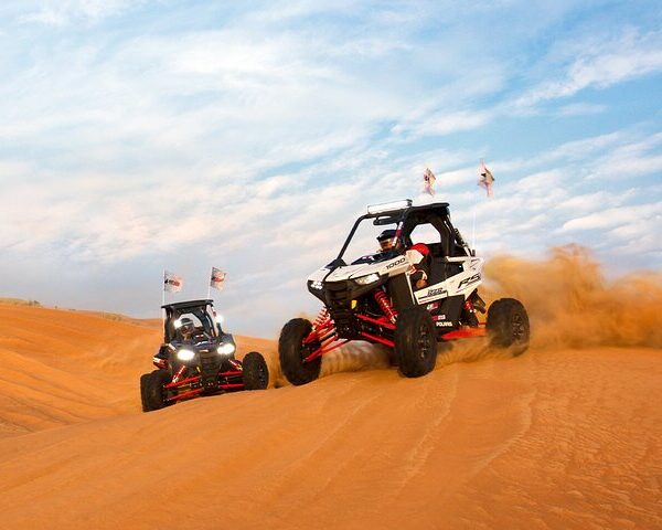 The Polaris RZR XP 1000 (1-Seater) is a high-performance dune buggy (UTV) built for aggressive off-roading. With its powerful 999cc engine, long-travel suspension, and race-ready design, it’s ideal for extreme desert adventures in Dubai. This vehicle offers full control, fast acceleration, and a thrilling ride over red sand dunes — perfect for solo riders who want an adrenaline-filled private experience.