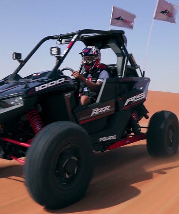 The Polaris RZR XP 1000 (1-Seater) is a high-performance dune buggy (UTV) built for aggressive off-roading. With its powerful 999cc engine, long-travel suspension, and race-ready design, it’s ideal for extreme desert adventures in Dubai. This vehicle offers full control, fast acceleration, and a thrilling ride over red sand dunes — perfect for solo riders who want an adrenaline-filled private experience.